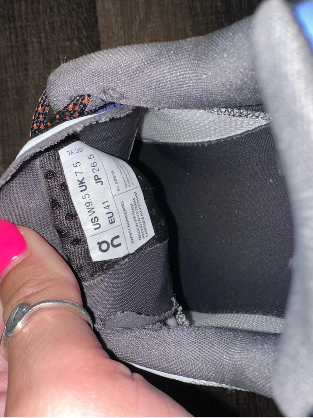On Running Kids Sneakers in Light Gray with Blue and Orange Accents